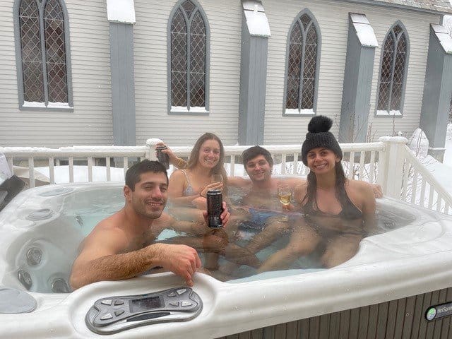 Guests enjoying Inn Victoria's hot tub